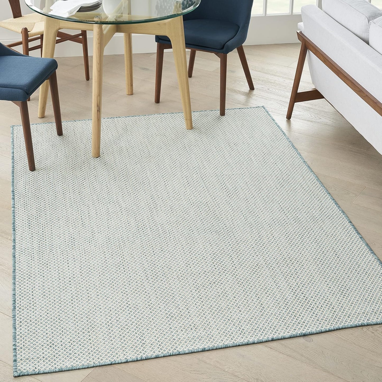Nourison Home Courtyard 60" x 84" Fabric Indoor/Outdoor Rug in Ivory Aqua